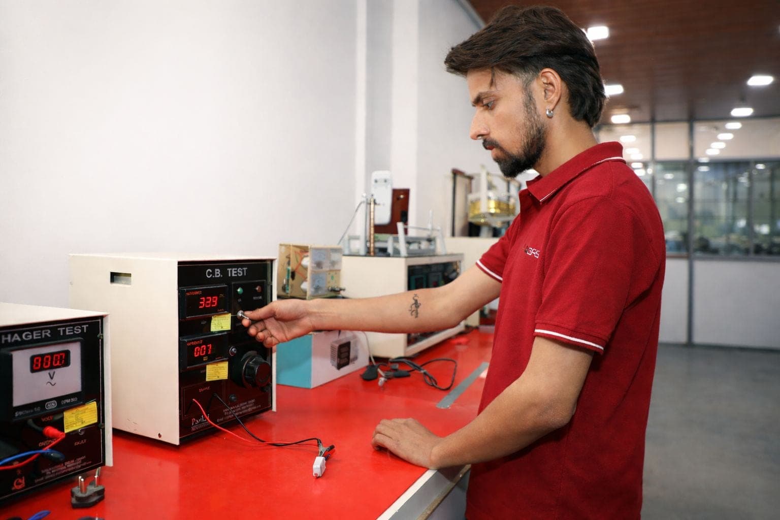 Topsail engineer running an electrical safety test on an appliance, part of BIS certification for appliances in India